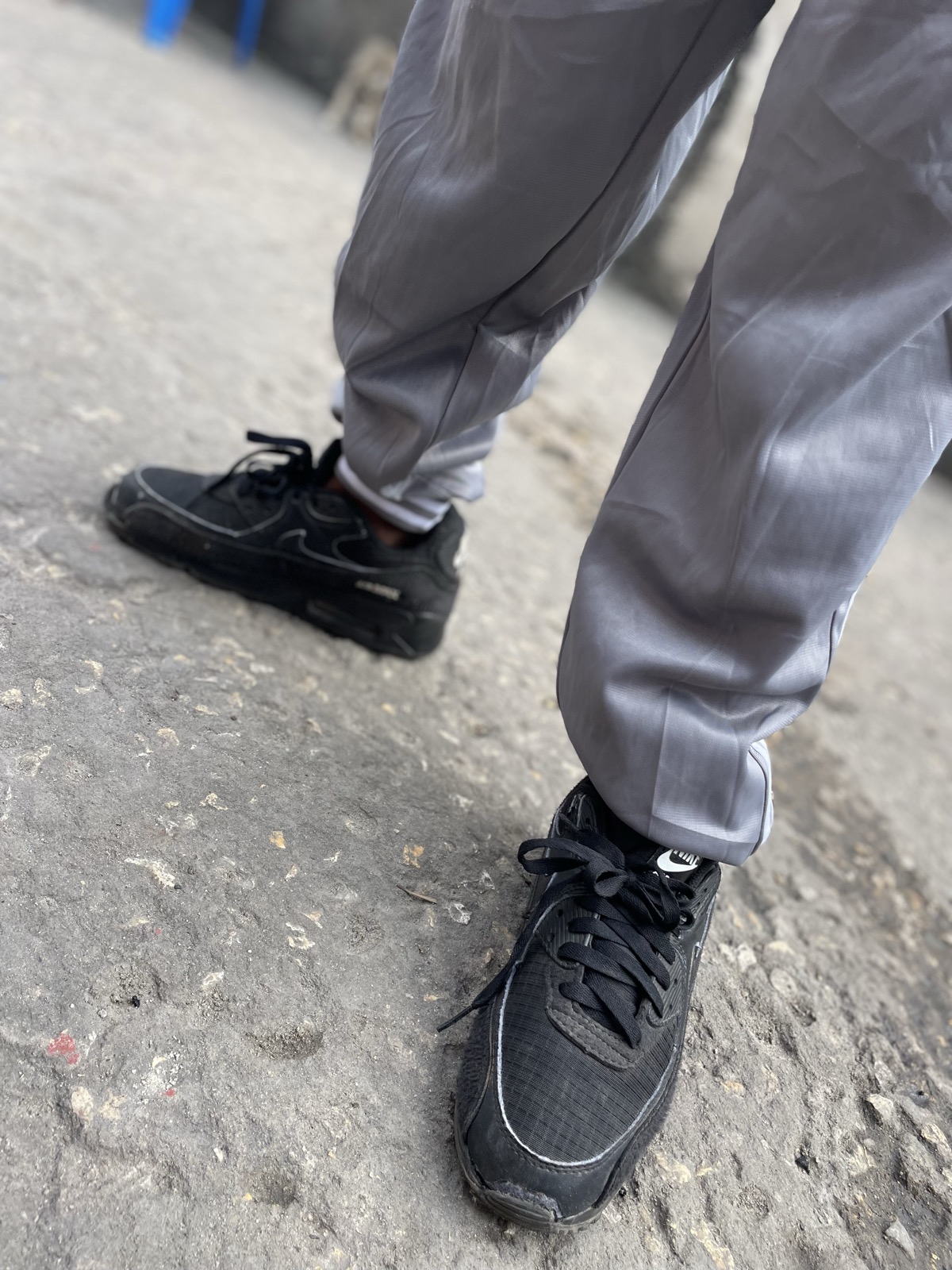Athman trying on his new shoes