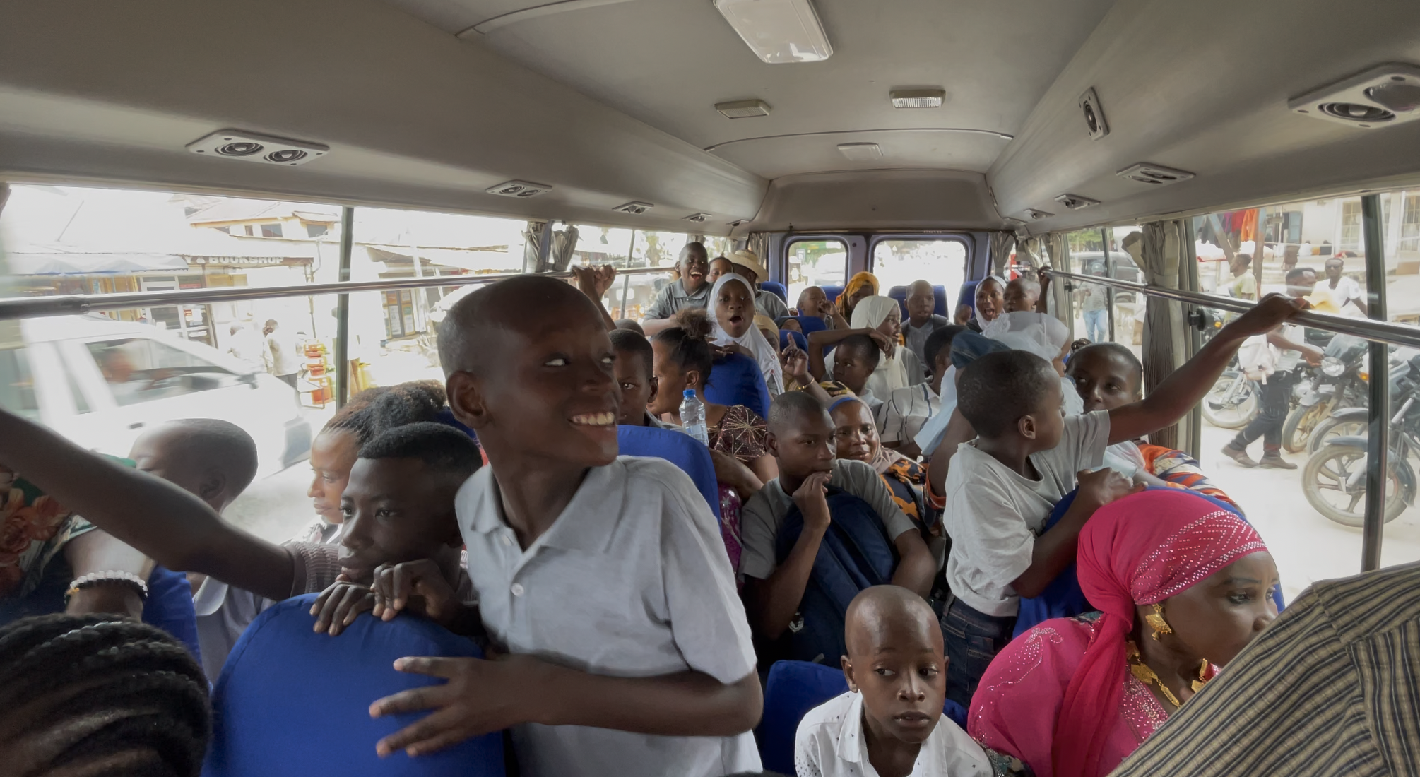 Child interacting with animals at Mbweni Zoo